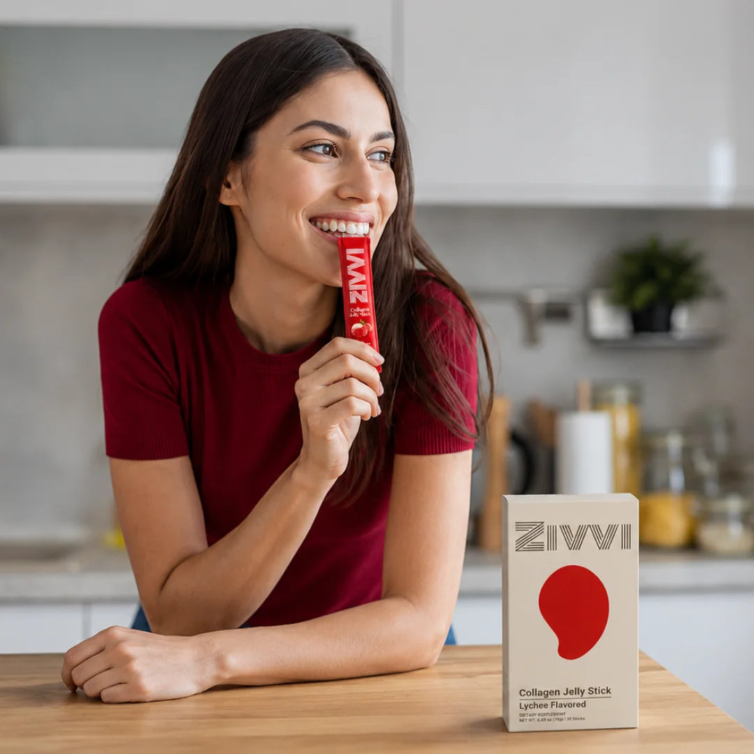 A woman enjoying a Zivvi collagen jelly stick