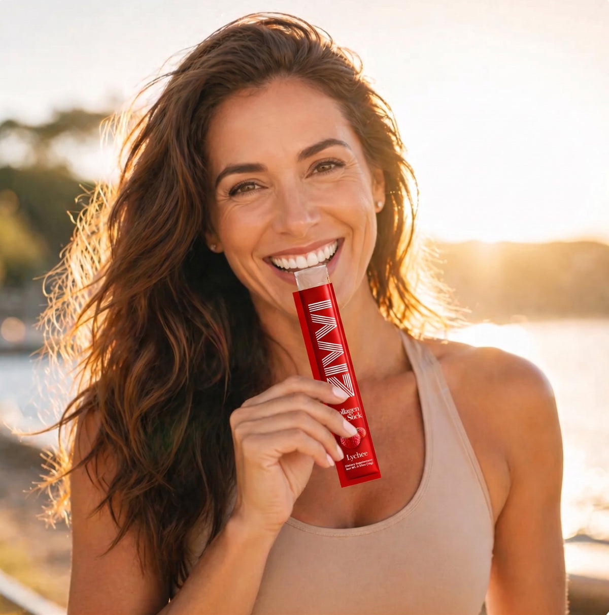 Woman holding a ZIVVI lychee collagen jelly stick